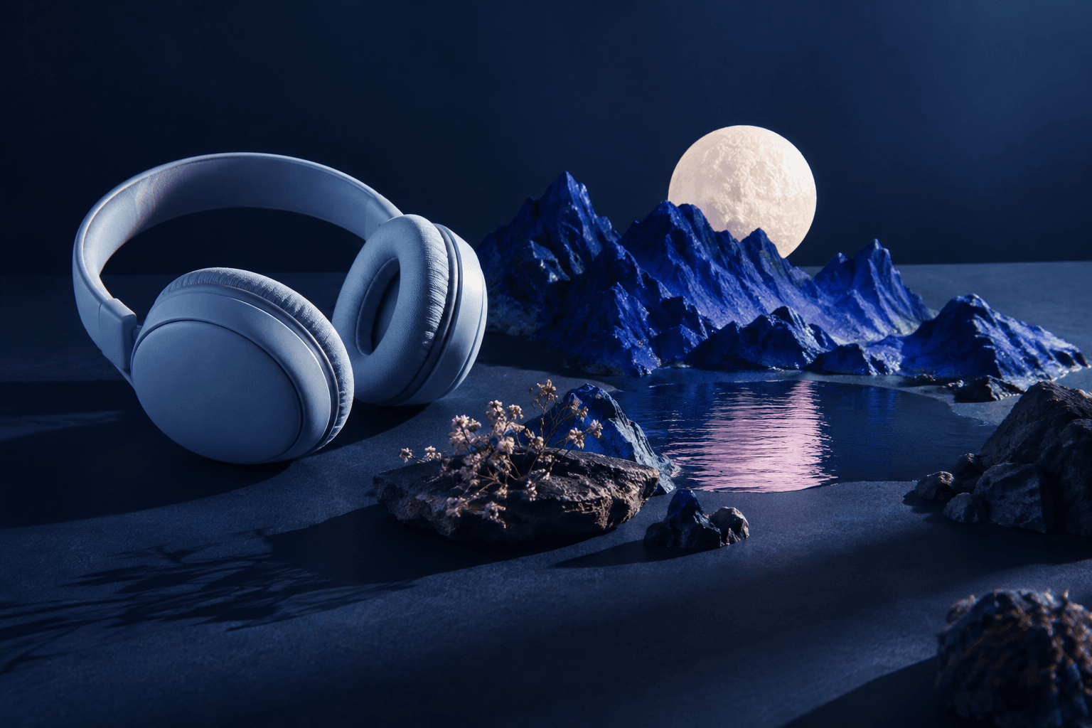 Pale blue headphones beside miniature cobalt mountains and a white moon